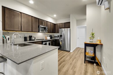 Kitchen counter with two stools nice engineered hardwood floors