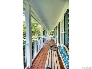 Charming country style front porch with custom bui