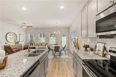 Kitchen with appliances with stainless steel finis