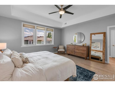 Primary bedroom with mountain views.