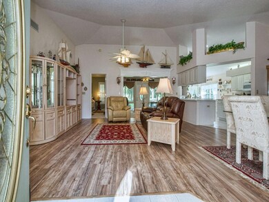 Family room view from tiled foyer