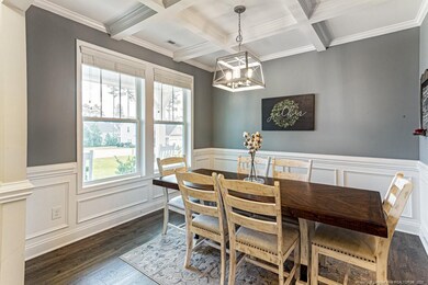 Dining room with coffered ceiling