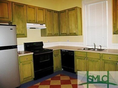 Kitchen located on the first floor of the townhome