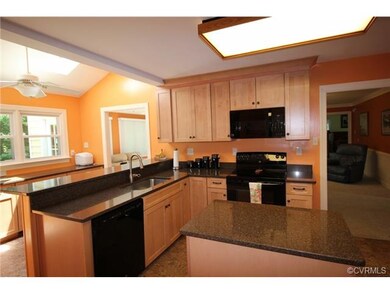 Kitchen opens to entertaining areas!