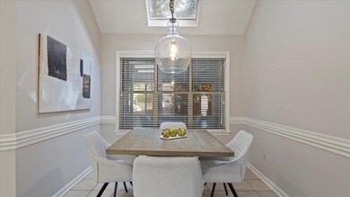 Dining room featuring light tile patterned floors