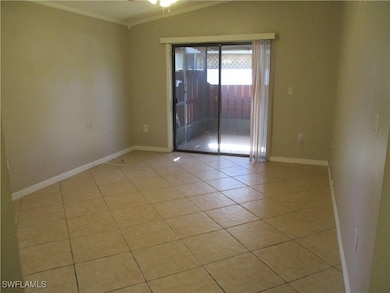 Family room leading to fenced courtyard.