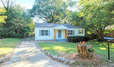 Bungalow with concrete driveway