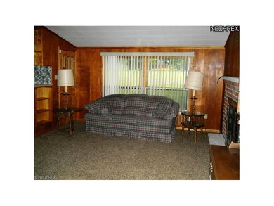 Family room overlooks backyard.  Door on the left 