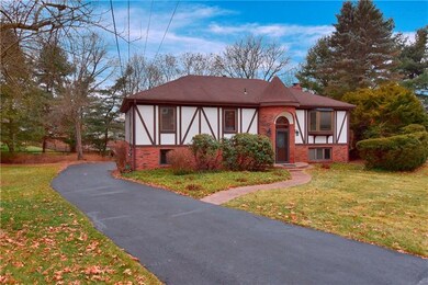 A level driveway leads to this move-in ready home 