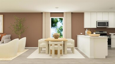 Kitchen with appliances with stainless steel finis