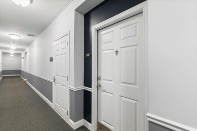 Spicket Commons unit 108, Methuen, MA 01844 - photo 3
