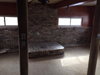 Family room with hearth for wood burning stove