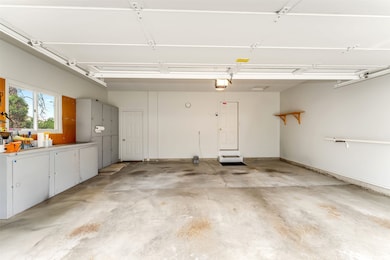 Double car garage with built-in cabinetry