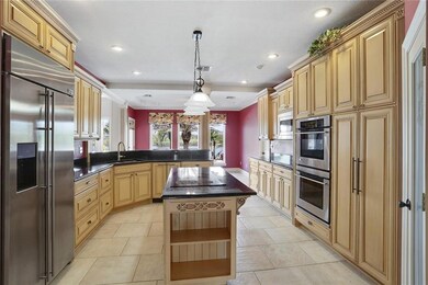 Awesome kitchen with breakfast area offering water