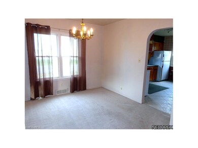 Dining Rm off Kitchen. Wood floors under carpet
