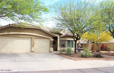 3 car garage w/cabinets!