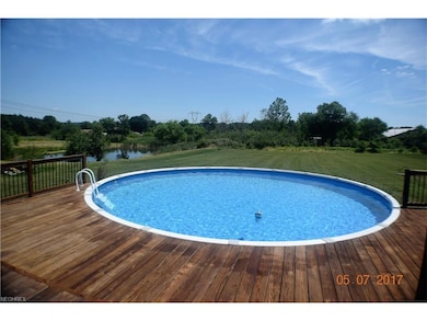 A large deck offers relaxation!  Cool off & enjoy the sun by your pool!