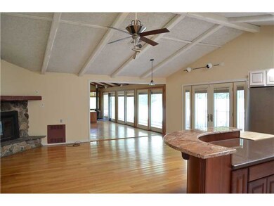 Living Room. Living room w/ fireplace. Dining area
