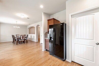 Spacious formal dining room with versatile potenti