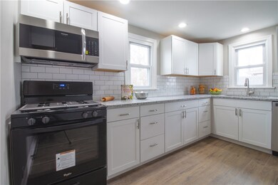 A brand new gas stove, microwave oven and dishwash