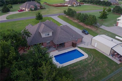 Exterior Back - Pool is 3.5' to 5.5' deep.  Dimens