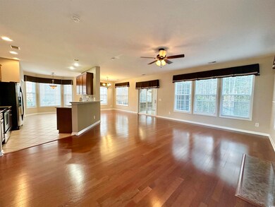 Unfurnished living room with plenty of natural lig