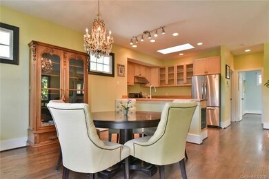 Dining area opens into kitchen