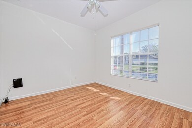 Spare room featuring light hardwood / wood-style f