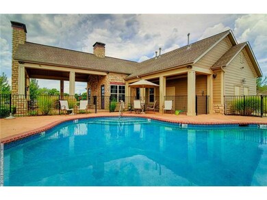 Exterior Front. COMMUNITY SWIMMING POOL