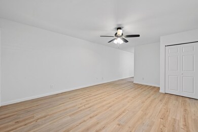 Unfurnished bedroom with light wood-type flooring