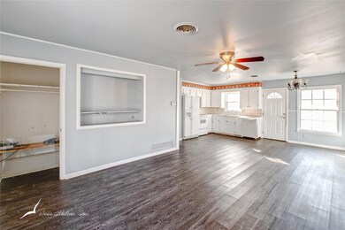 Open concept living and kitchen area.