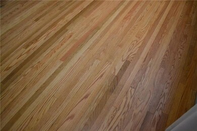 REAL hardwood flooring is found in the the living 