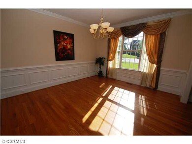 Dining Room - Front formal dining room with hardwo