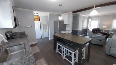Kitchen with appliances with stainless steel finis