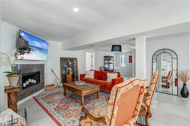 Living room with a tiled fireplace