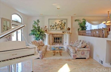 Formal Living Room with French Doors and Wood Burn