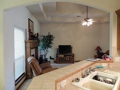 Kitchen. Bar top in kitchen connects to dining and