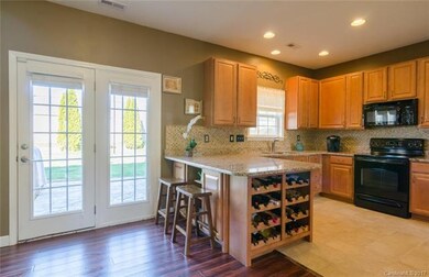Custom Kitchen with Built in Wine Rack