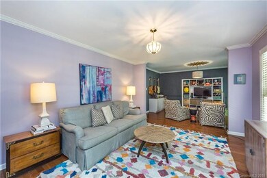 Formal living room with crown molding