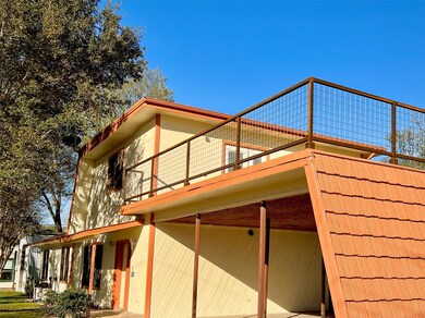 View of home's exterior featuring a balcony
