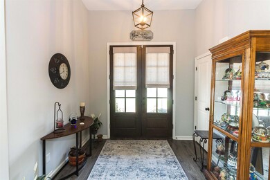 Entryway featuring dark hardwood / wood-style floo