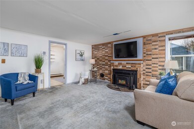 Doorway leads to kitchen and back of house.