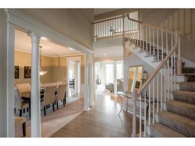 Entry way with view of dining room, living room an