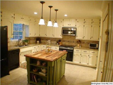Wow what a kitchen! Granite counter tops, new ligh