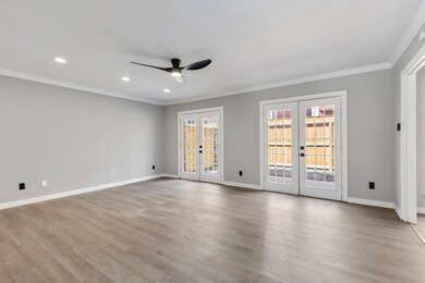 Dining room that could be used as second living room / family room opening onto the private patio.