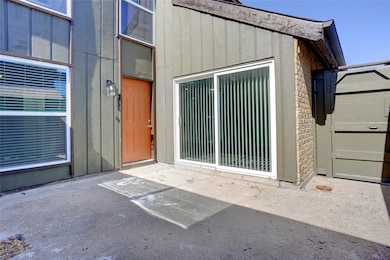 Doorway to property with a patio