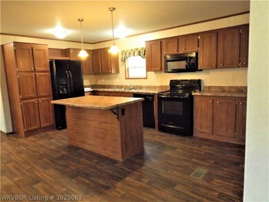 Large kitchen with island and lots of storage.  Re