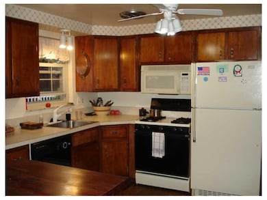 Kitchen. Pretty birch cabinets in the kitchen that