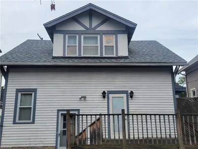 The large deck in the rear adds extra outdoor living space.