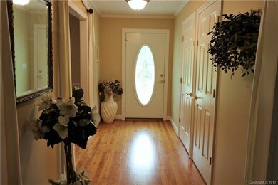Front Entrace Hall with formal Dining Room to the 